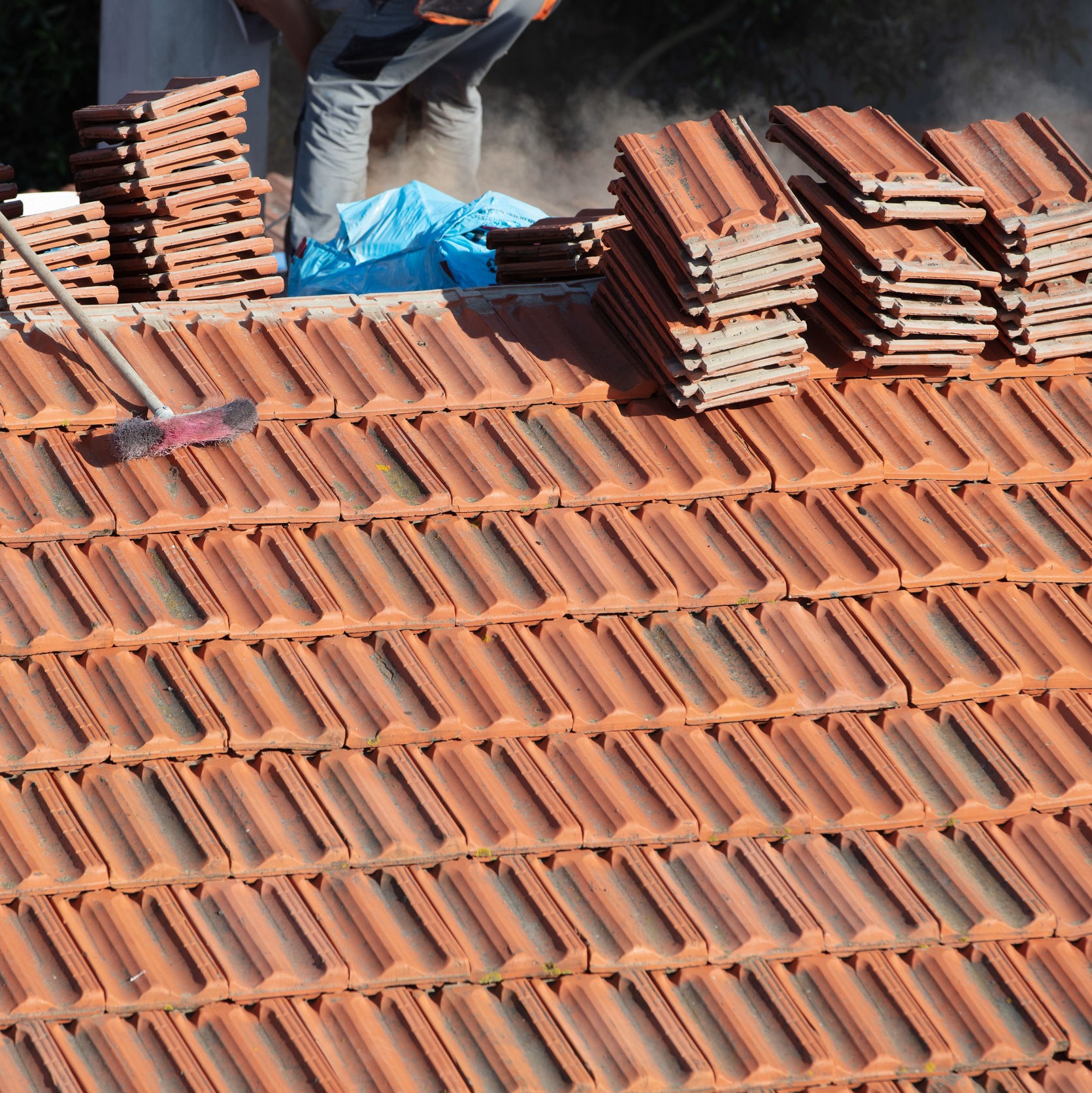 repairing the roof of a home